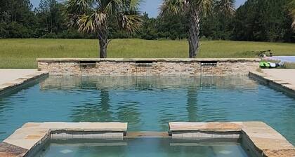 Luxurious 7-bedroom Estate with Movie Theatre, Pool, and Basketball Court