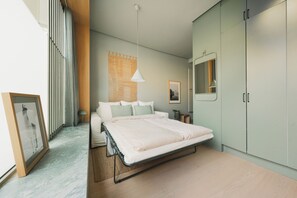 1 habitación, tabla de planchar con plancha, wifi y ropa de cama 