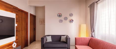 Apartment (2 Bedrooms) | Living area | TV
