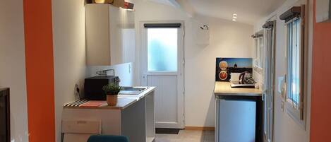 Fridge, microwave, coffee/tea maker, toaster