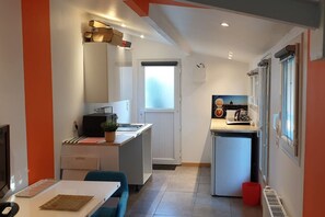 Fridge, microwave, coffee/tea maker, toaster