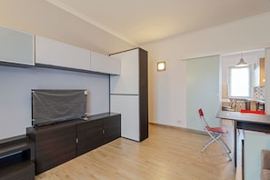 Apartment (1 Bedroom) | Living area | 33-inch TV with cable channels