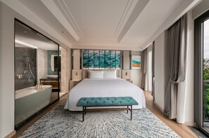 Executive Suite, Balcony, City View | Minibar, in-room safe, desk, laptop workspace - La Siesta Premium Lakeside (Hanoi)