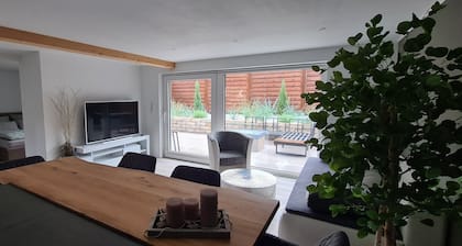 Modern vacation bungalow in the Neuhof forest settlement on the Großer Wünsdorfer See lake