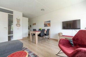 Apartamento conforto, 2 quartos | Sala de estar