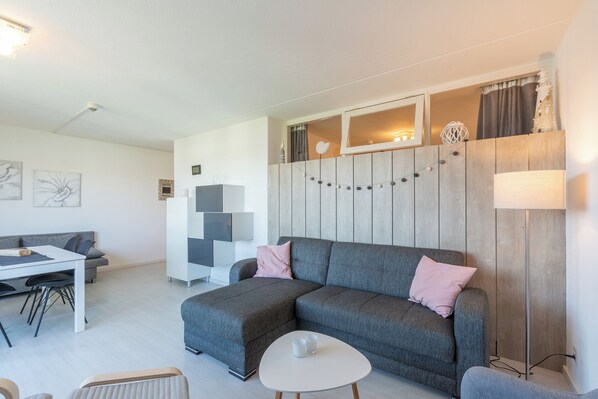 Apartamento luxo, 1 quarto | Sala de estar