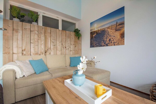 Apartamento conforto, 2 quartos | Sala de estar