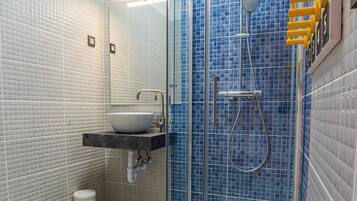 Comfort Shared Dormitory | Bathroom | Shower, soap, toilet paper