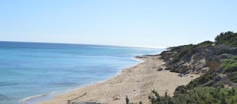 Seafront Juniper apartment with large veranda, 20m from the crystal clear sea.