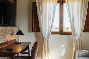 Desk, laptop workspace, free WiFi, bed sheets