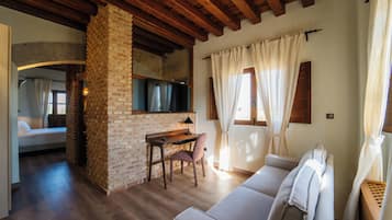 Desk, laptop workspace, free WiFi, bed sheets