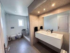 Hair dryer, bidet, towels, soap