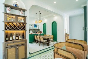 Family Villa, Garden View | Living area | 45-cm flat-screen TV with satellite channels