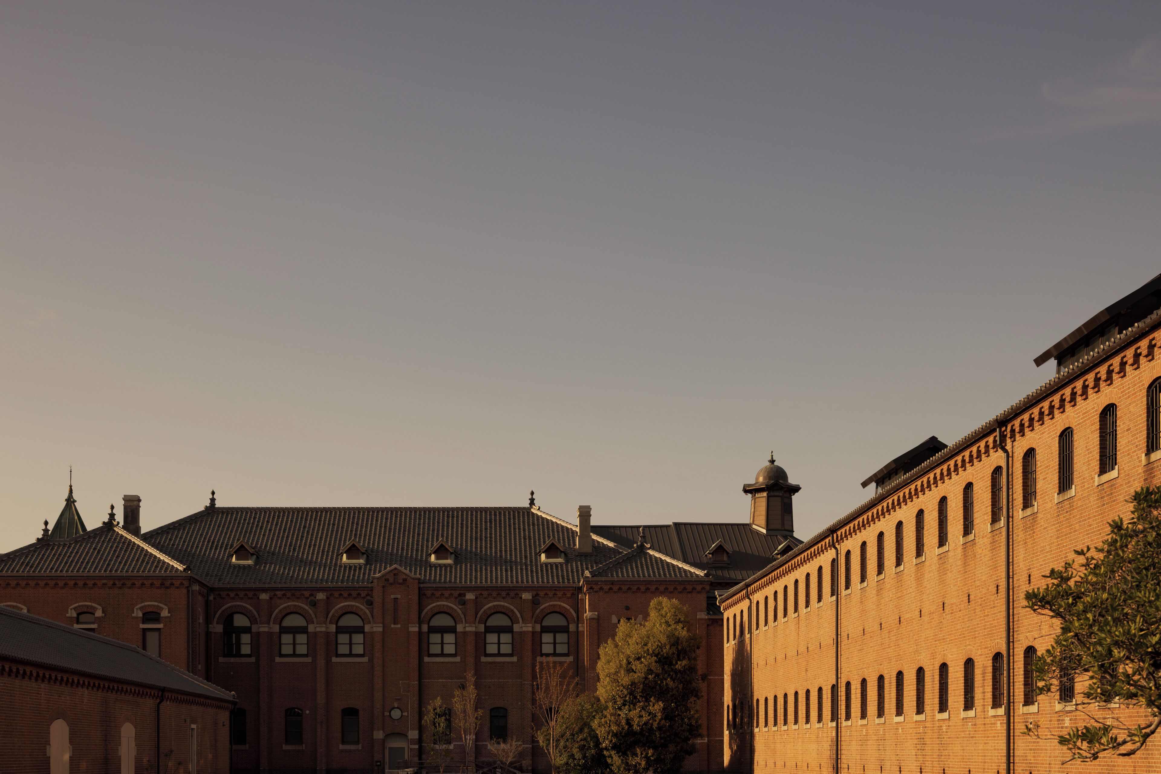 A historic building with arched windows and a brick facade.