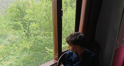 Cozy Mukteshwar homestay with Himalayan views and warm local hospitality.