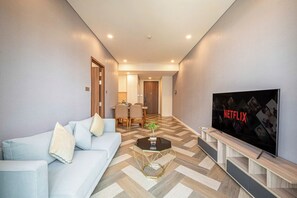 Deluxe Apartment, 1 Bedroom, Balcony, City View | Living area