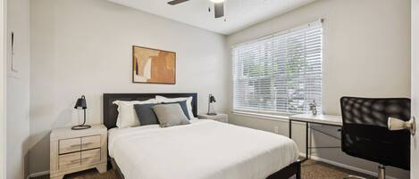 1 bedroom, desk, iron/ironing board, travel crib