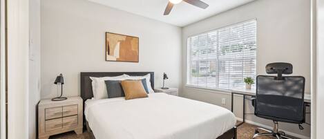 1 bedroom, desk, iron/ironing board, travel crib