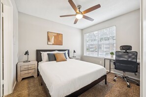 1 bedroom, desk, iron/ironing board, travel crib