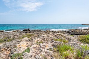 On the beach, beach towels