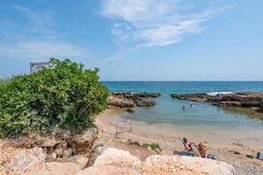 On the beach, beach towels