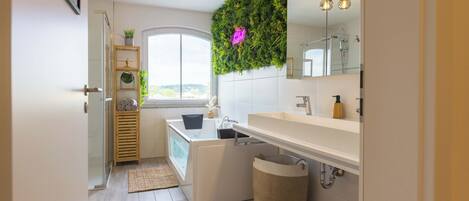 Jetted tub, hair dryer, towels, soap