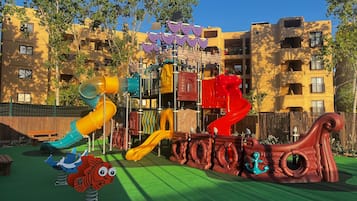 A playground with slides and climbing structures.