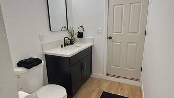 Hair dryer, towels, soap, toilet paper