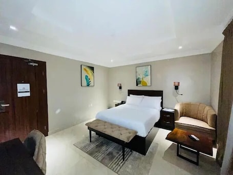 Economy Room, Balcony, City View | Desk, laptop workspace, blackout drapes, soundproofing