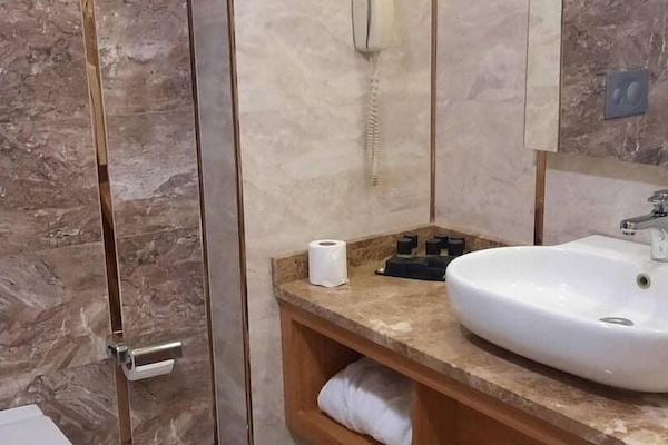 Presidential Double Room Single Use, City View | Bathroom | Slippers