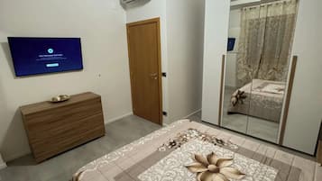 3 habitaciones, tabla de planchar con plancha, wifi y ropa de cama