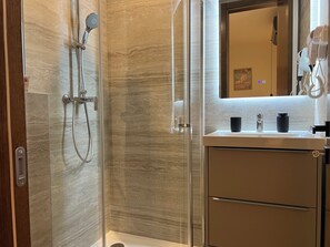 Hair dryer, towels, soap, toilet paper