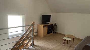 Smart TV, DVD player, table football, books