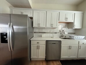 Fridge, microwave, oven, stovetop - Newly Renovated 4 Bedroom 2 Bath Condo with Views from Deck (Ocean City)