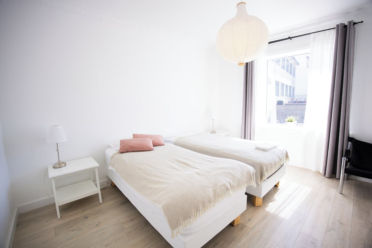 Laptop workspace, free WiFi, bed sheets