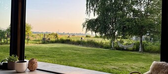 Stylish waterfront villa with luxurious private wellness, 5 min. From Amsterdam