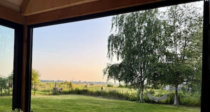 Stylish waterfront villa with luxurious private wellness, 5 min. From Amsterdam