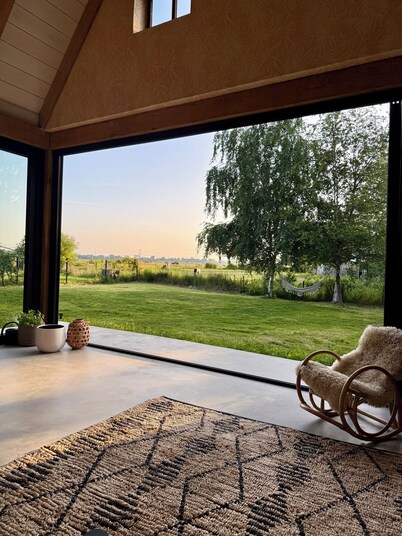 Stylish waterfront villa with luxurious private wellness, 5 min. From Amsterdam