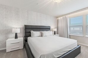 Bedroom 5 with a king size bed and a private bathroom