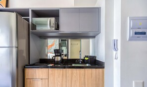 Fridge, microwave, stovetop, coffee/tea maker