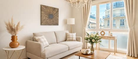 Premium Apartment, Courtyard View | Living area | 127-cm Smart TV with digital channels