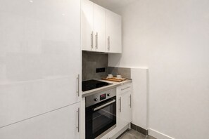 Leilighet – premium, bakgårdsutsikt | Eget kjøkken | Espressomaskin, vannkoker og brødrister