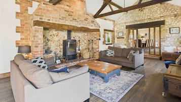 TV, fireplace, books, offices