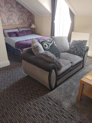 Premium bedding, down duvets, desk, laptop workspace