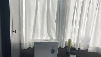 Shower, towels, soap, toilet paper