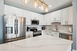 Condo, 3 Bedrooms | Private kitchen | Fridge, oven, coffee/tea maker, toaster - Laketown Wharf 2123 3 Bedroom Condo (Panama City Beach)