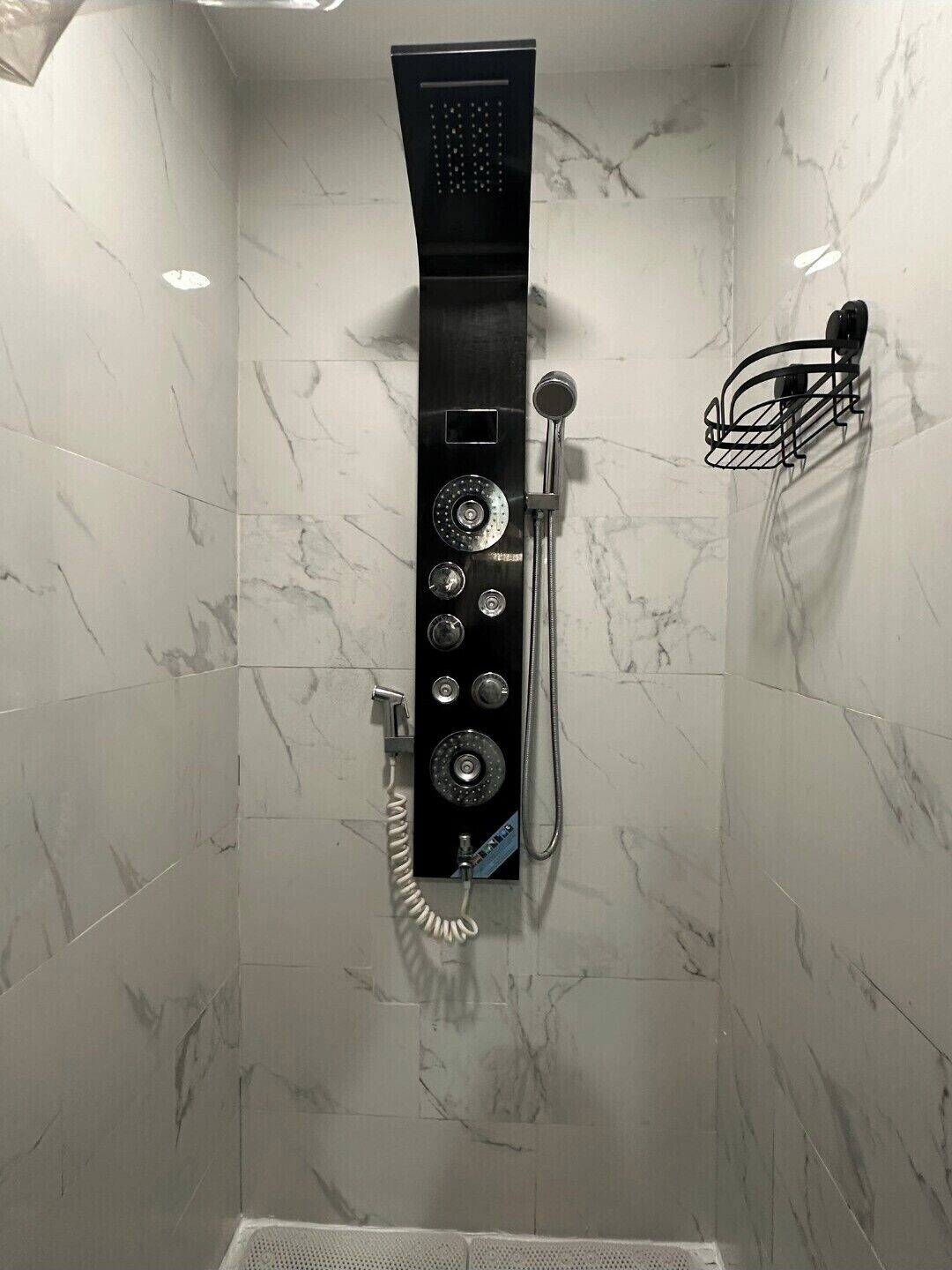 Shower, towels, soap, toilet paper