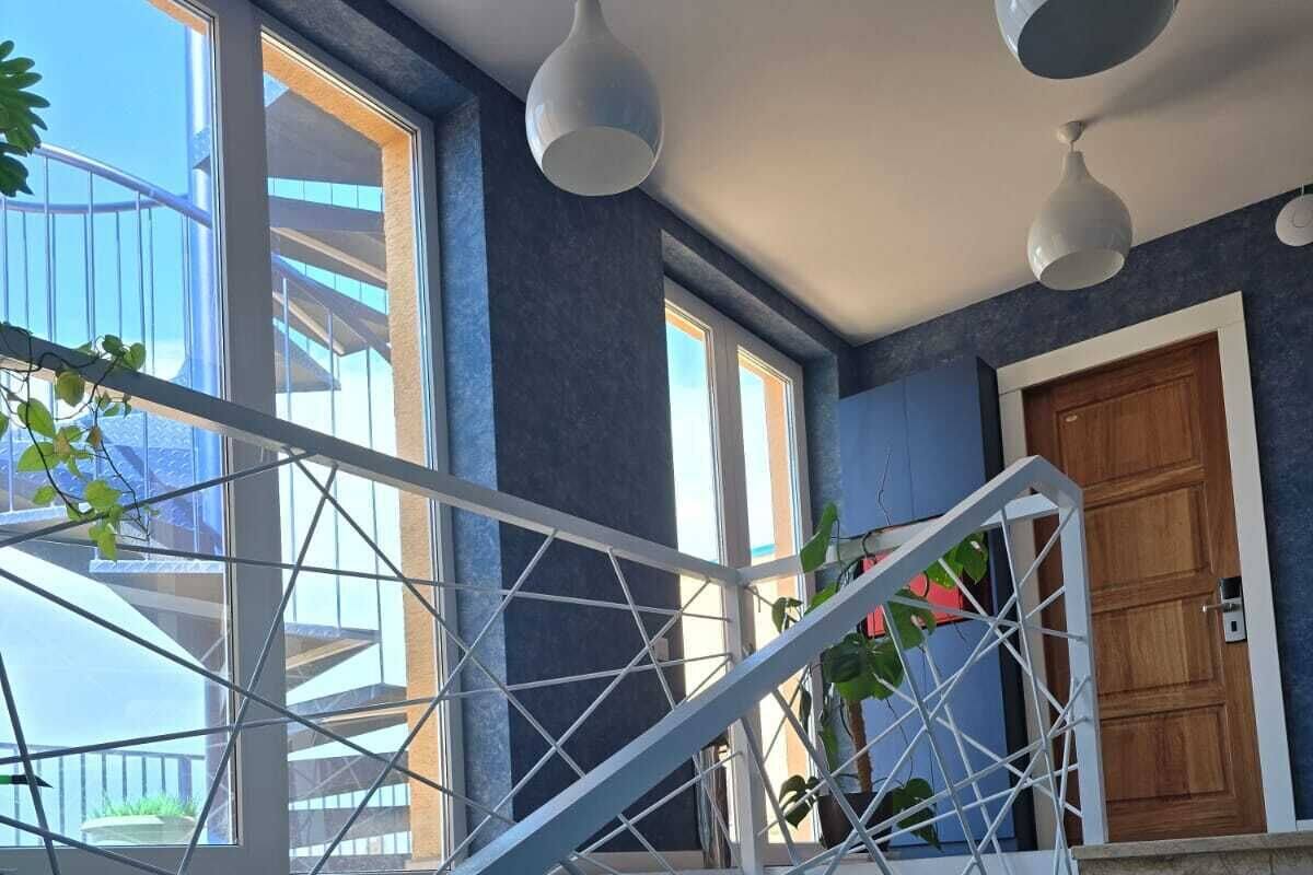 Habitación Confort doble | Zona de estar | Smart TV de 90 cm con canales digitales, suelo radiante