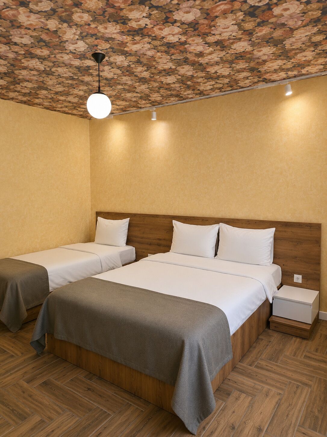 Premium bedding, Tempur-Pedic beds, desk, laptop workspace