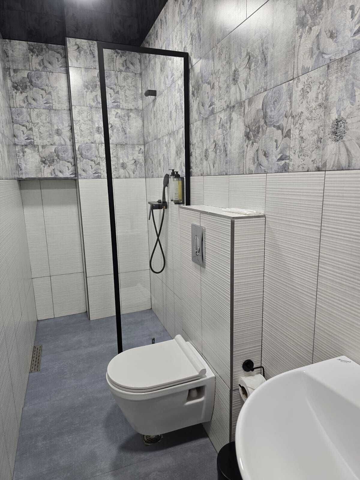 Shower, eco-friendly toiletries, hair dryer, towels